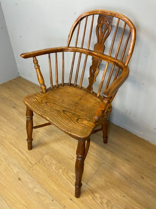 Early Nineteenth Century Yew and Elm Windsor Chair with Crinoline Under Stretcher