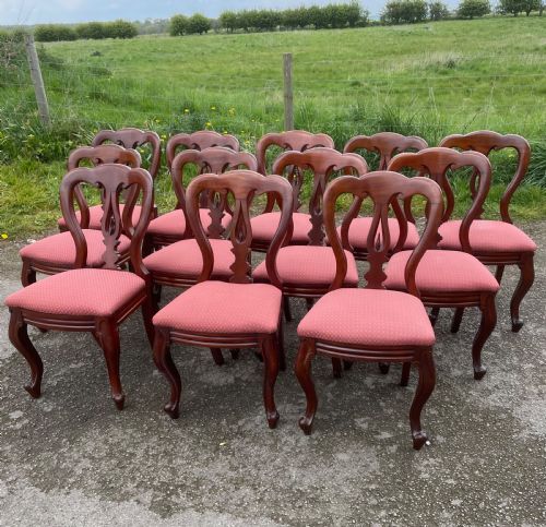 C19th Set of 12 Mahogany Spear Point Balloon Back Dining Chairs