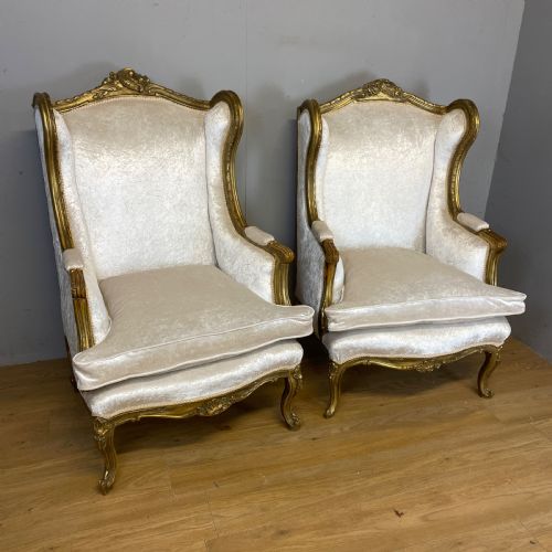 EARLY C20TH PAIR OF CARVED AND GILDED FRENCH WINGED ARMCHAIRS - ADDITIONAL PHOTO 2