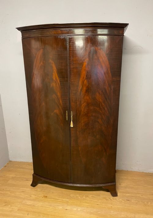 C19th Bow Front Flame Mahogany Wardrobe