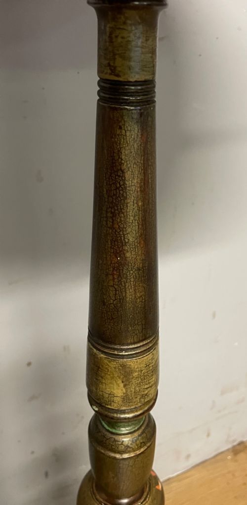 A 19th-century gilt and ebonised torchere stand featuring a circular needlework top, a turned column stem, and tripod feet. View VII