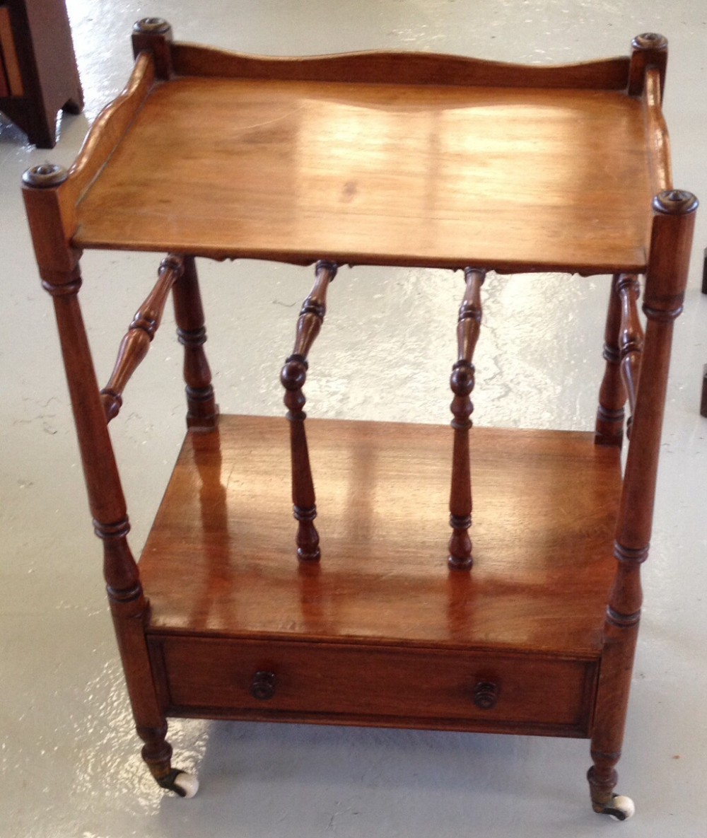 Victorian mahogany Canterbury whatnot with galleried top on turned supports 