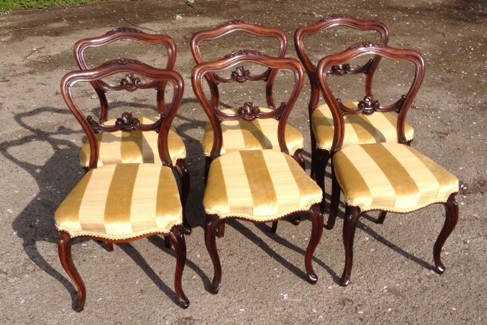 Set of six Victorian rosewood dining chairs with carved frames circa 1860