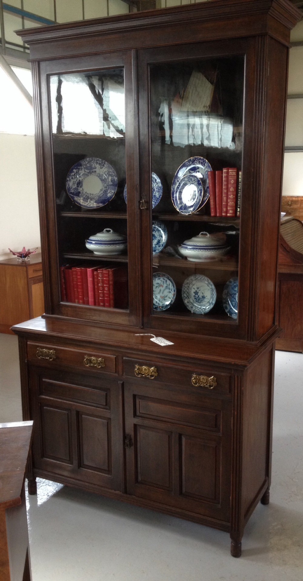 Antique Victorian bookcase over cupboard circa 1880