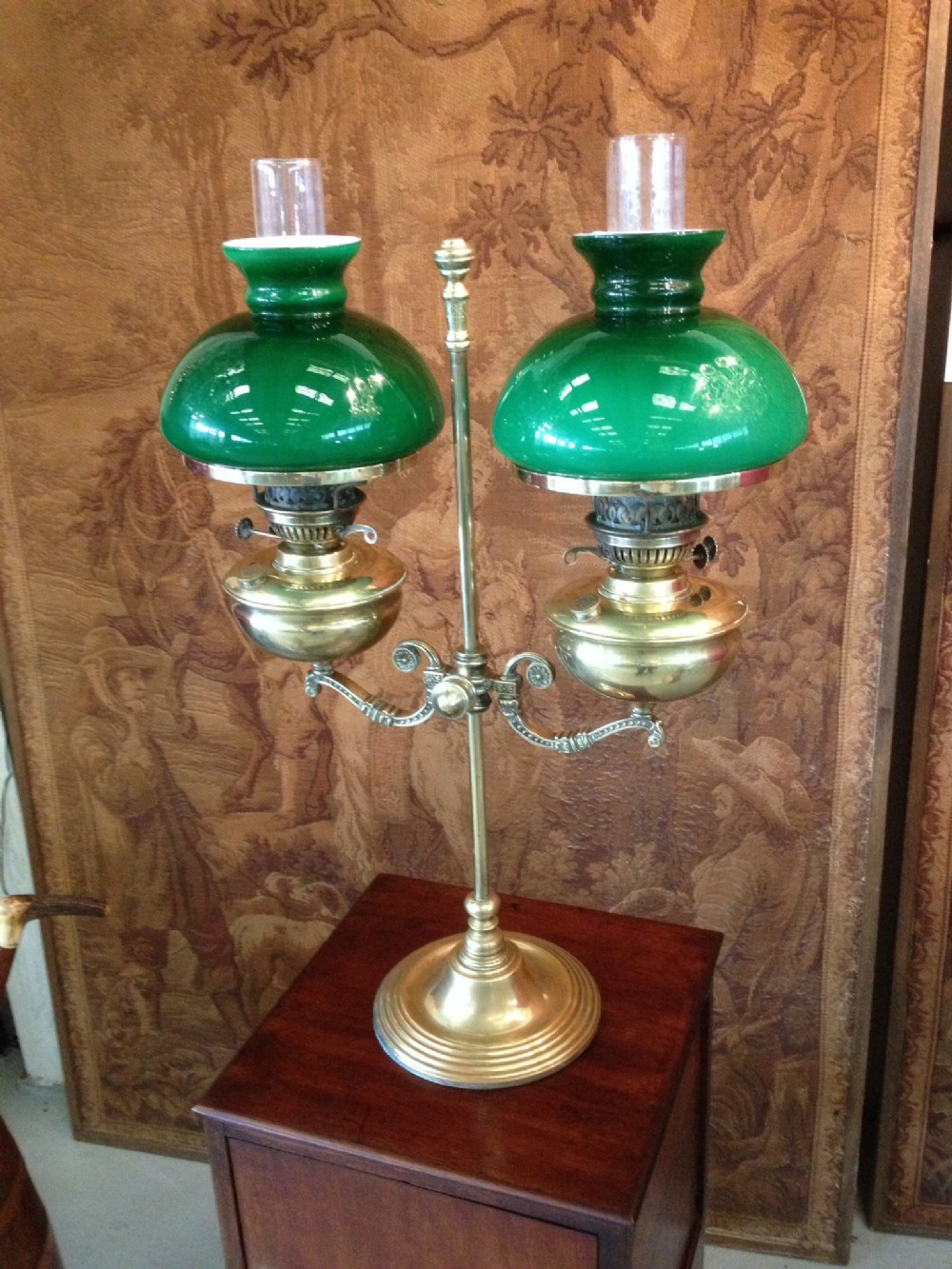 Victorian brass double adjustable oil lamp with original green shades
