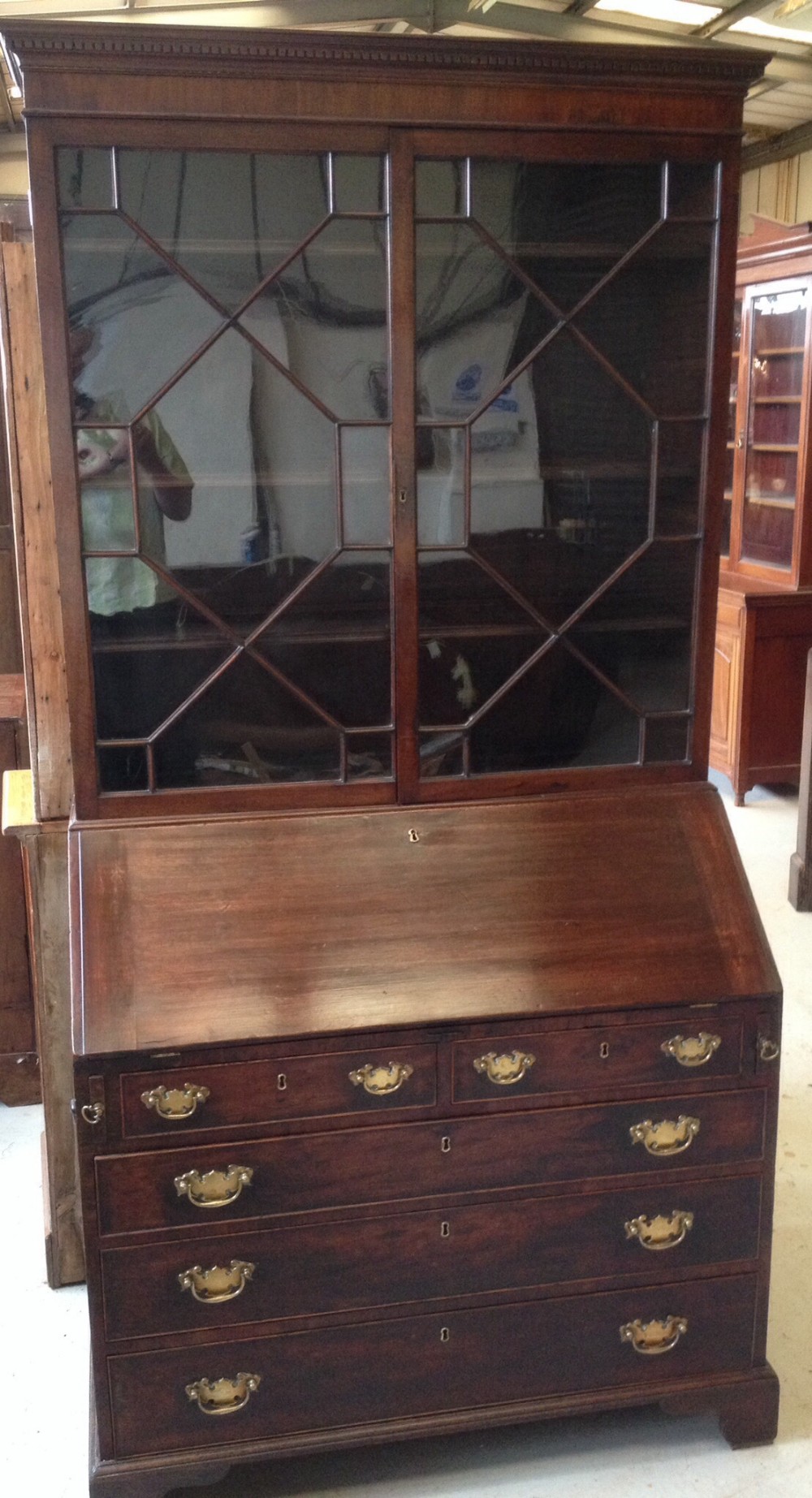 Antique Georgian mahogany bureau bookcase on bracket feet 