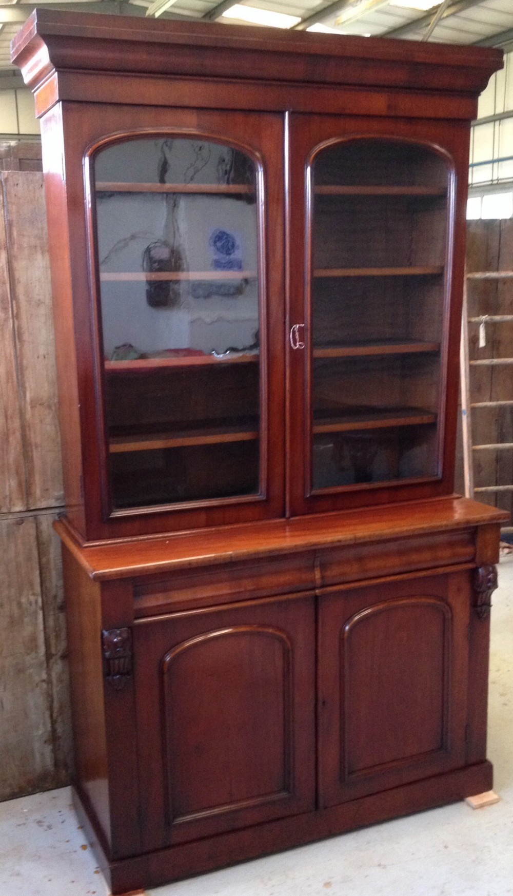 Antique Victorian mahogany bookcase over cupboard circa 1870