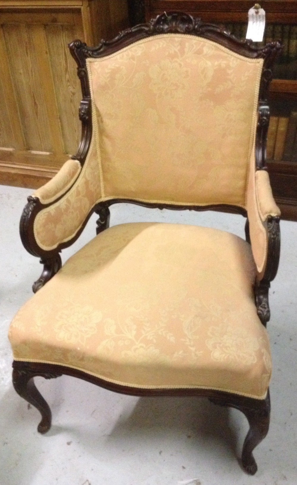 Late victorian rococo style mahogany framed salon armchair 