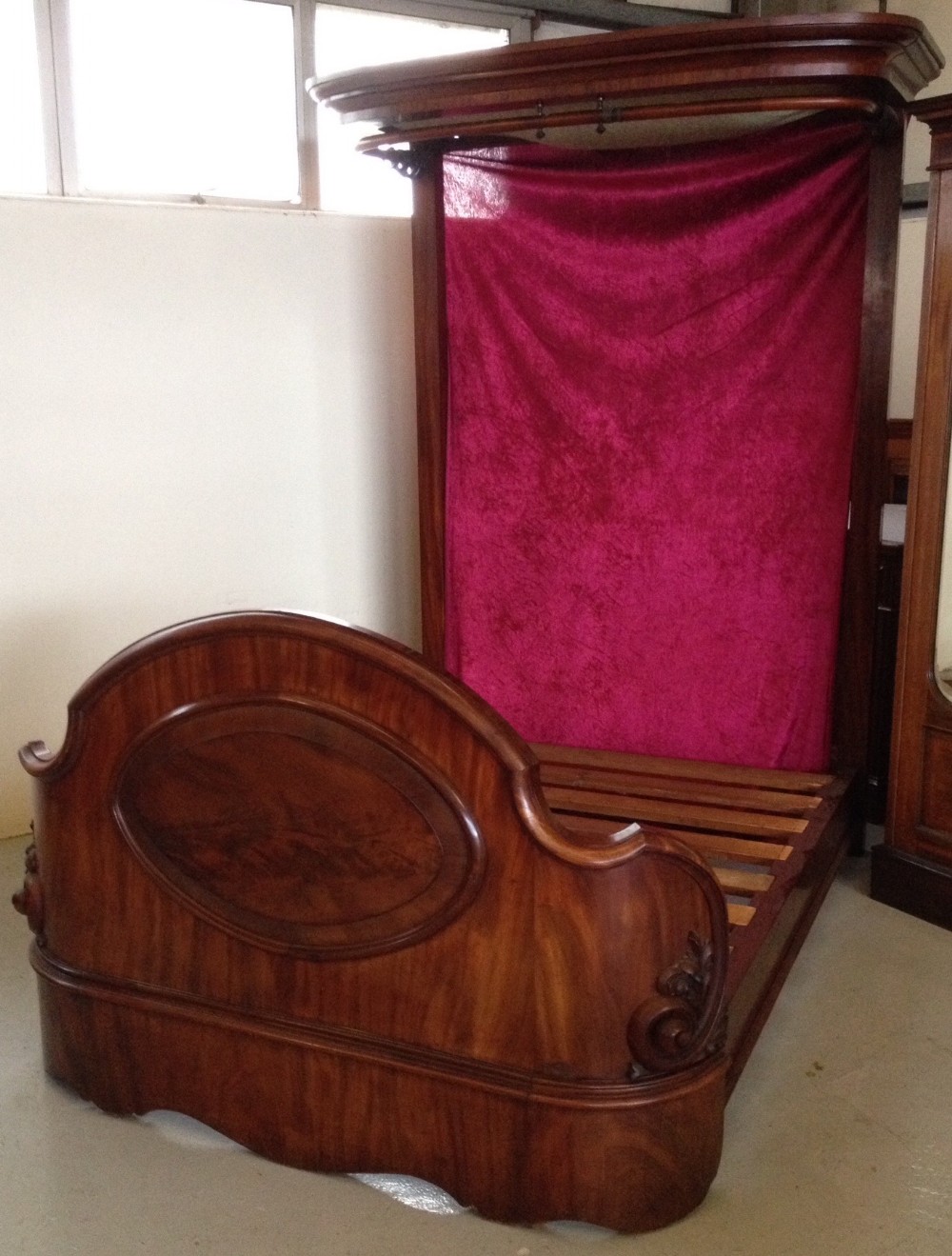 Victorian mahogany half tester king size bed with carved and panelled base
