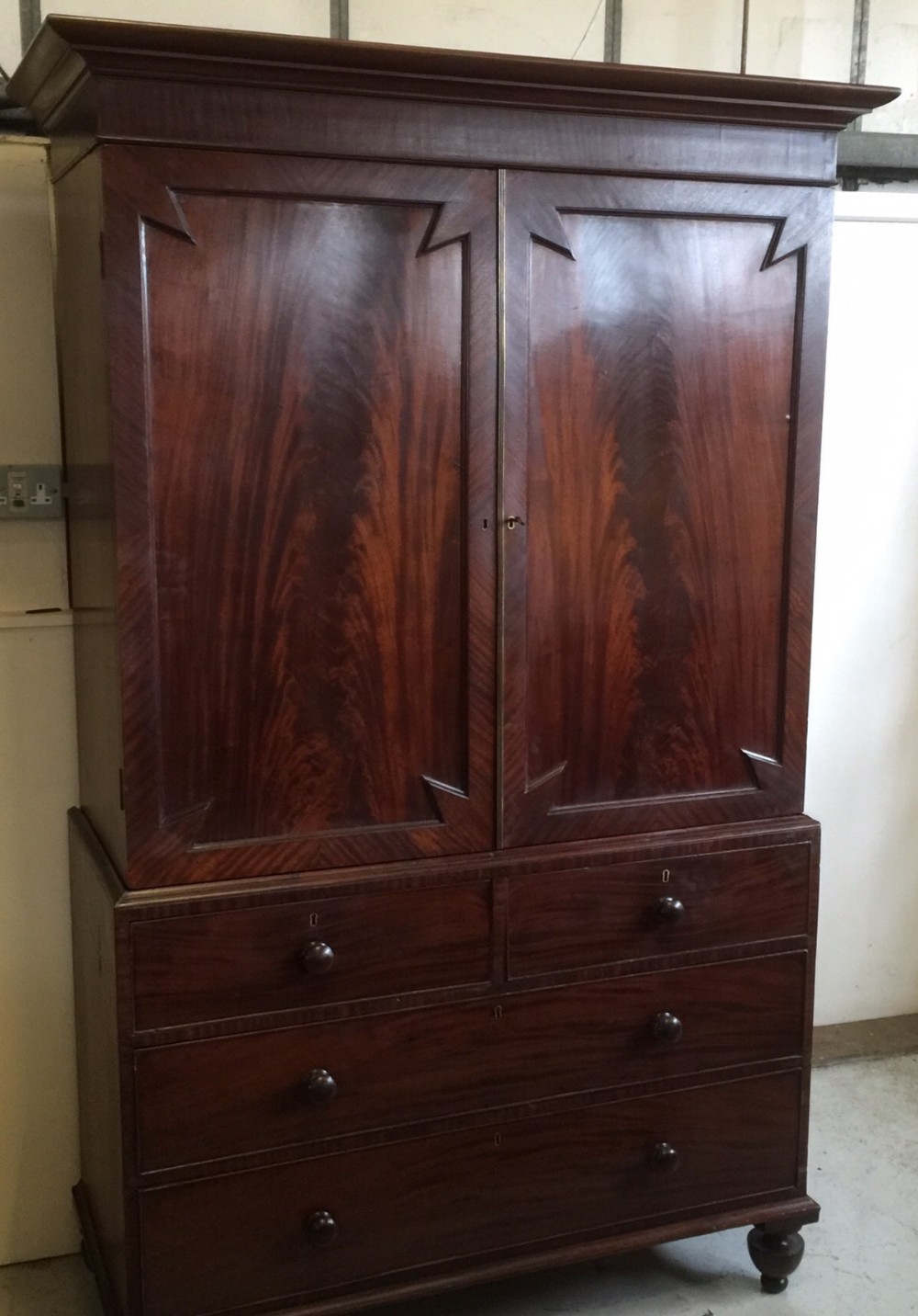 Nineteenth century flame mahogany clothes press