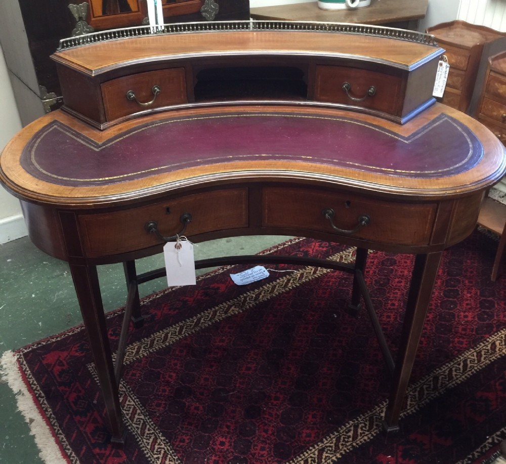 Inlaid mahogany Sheraton revival kidney shaped desk 