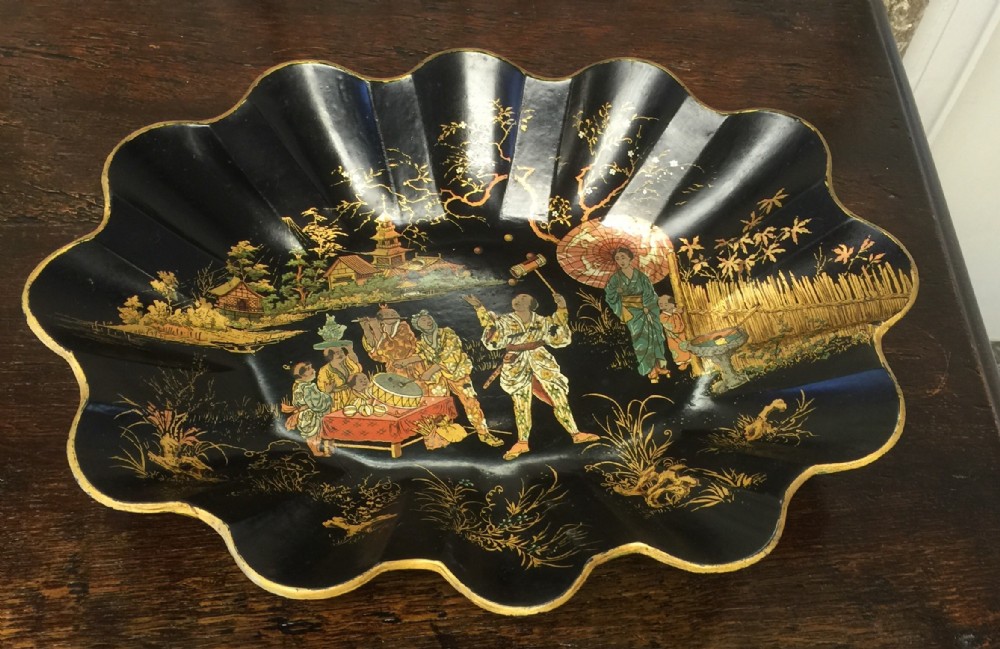 Black lacquered scalloped oval bowl. Late nineteenth century. 