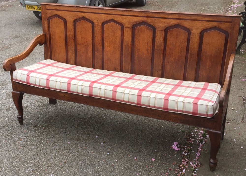 19th century golden oak settle on cabriole legs 