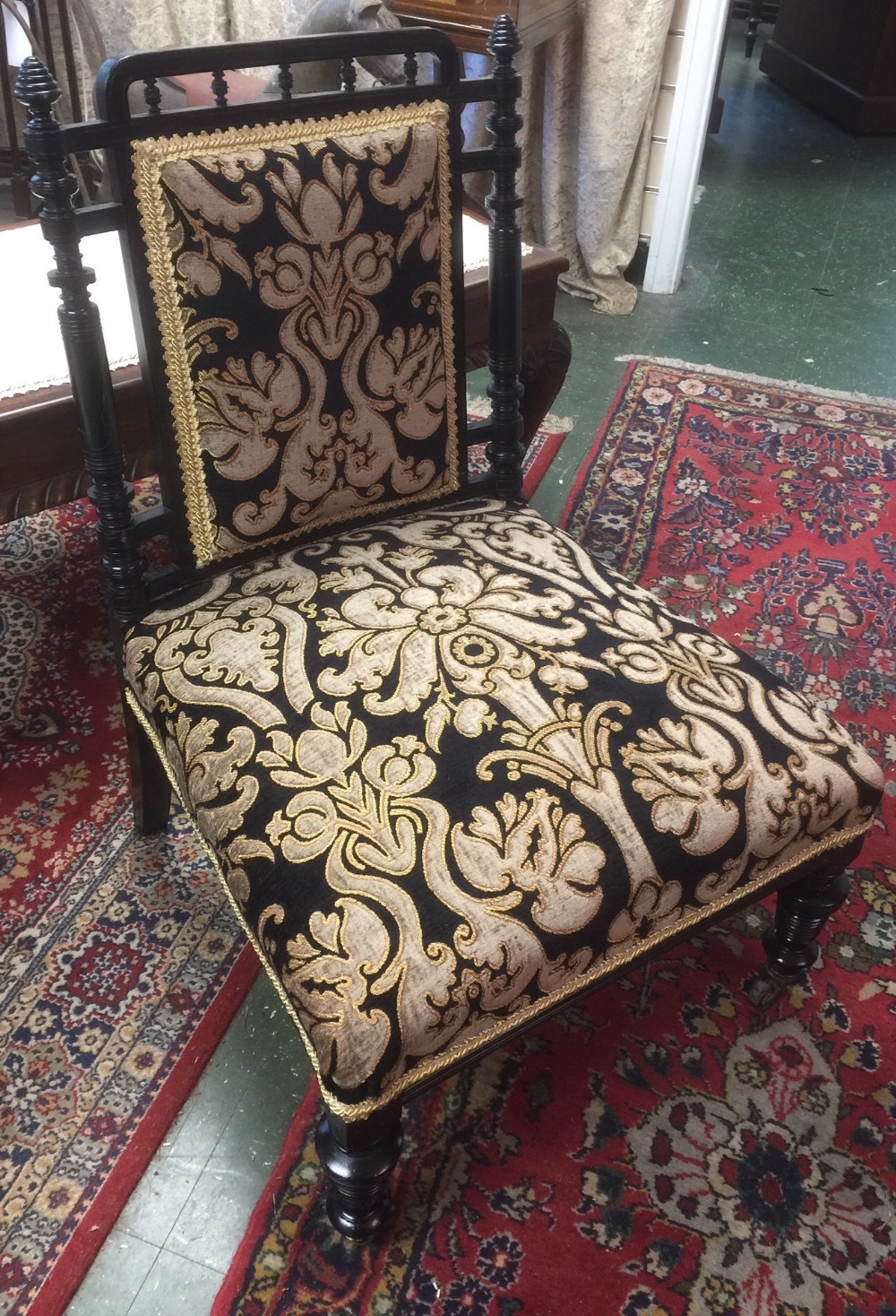 Aesthetic movement ebonised nursing chair. Circa 1890