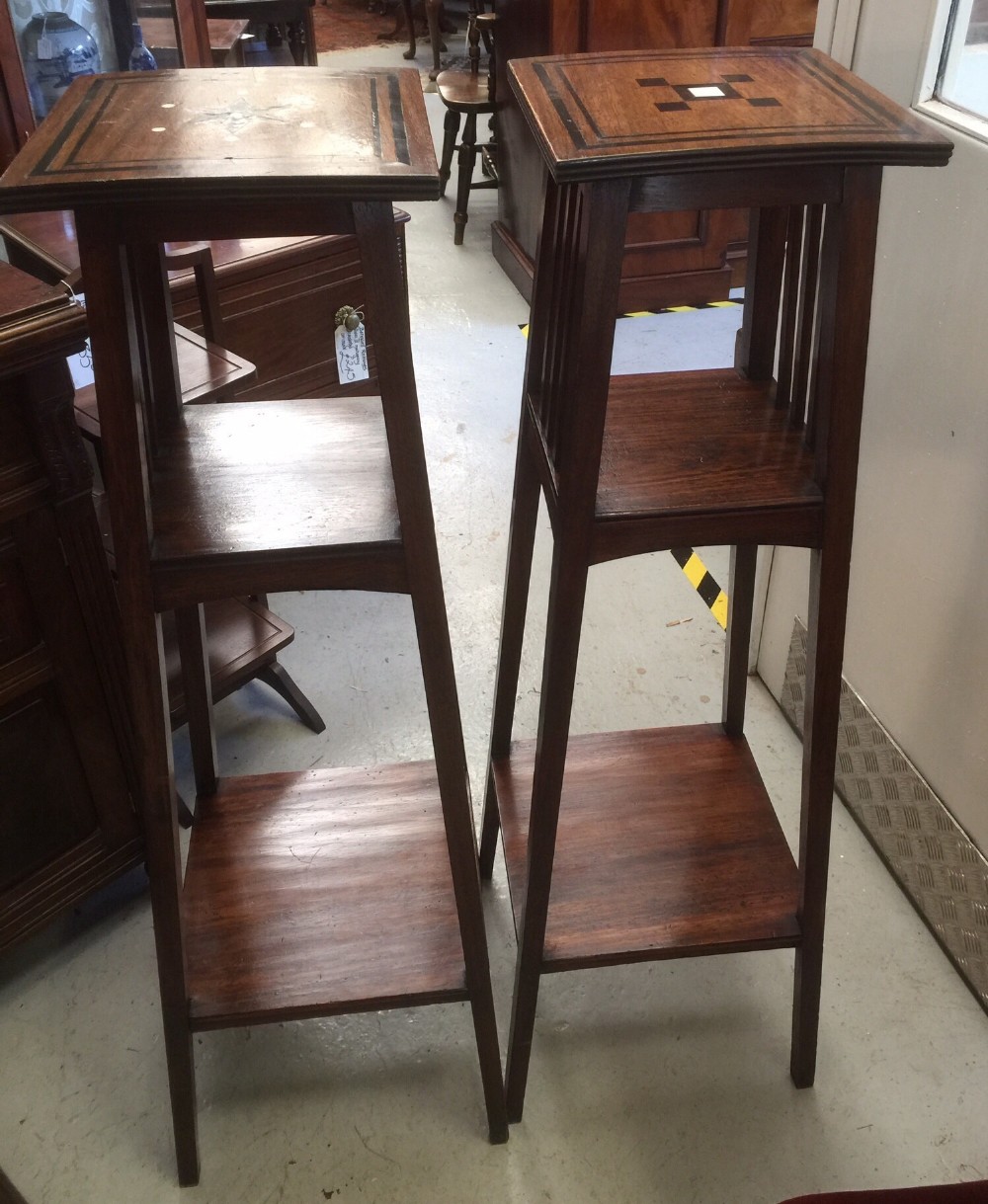Pair arts and crafts mahogany inlaid stands