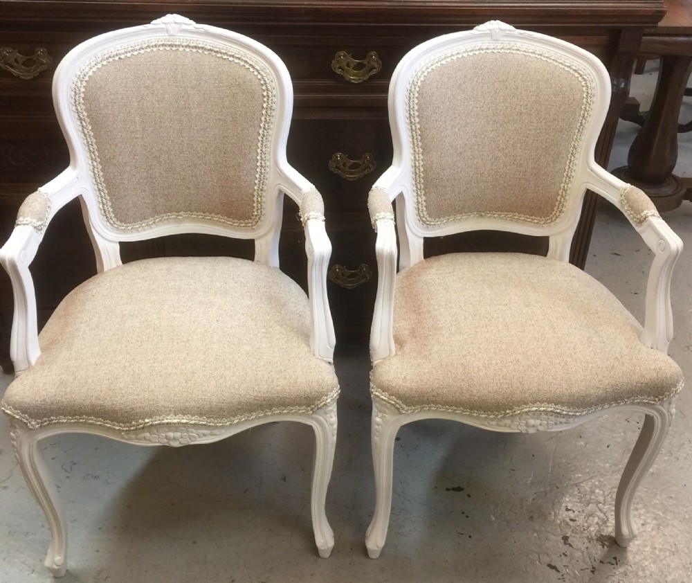 Pair of carved French painted armchairs circa 1920. 