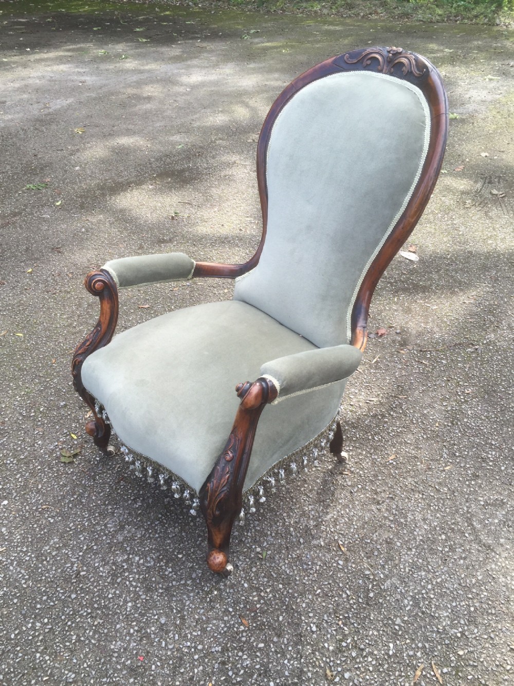 Victorian walnut cabriole legged spoon backed open armchair 