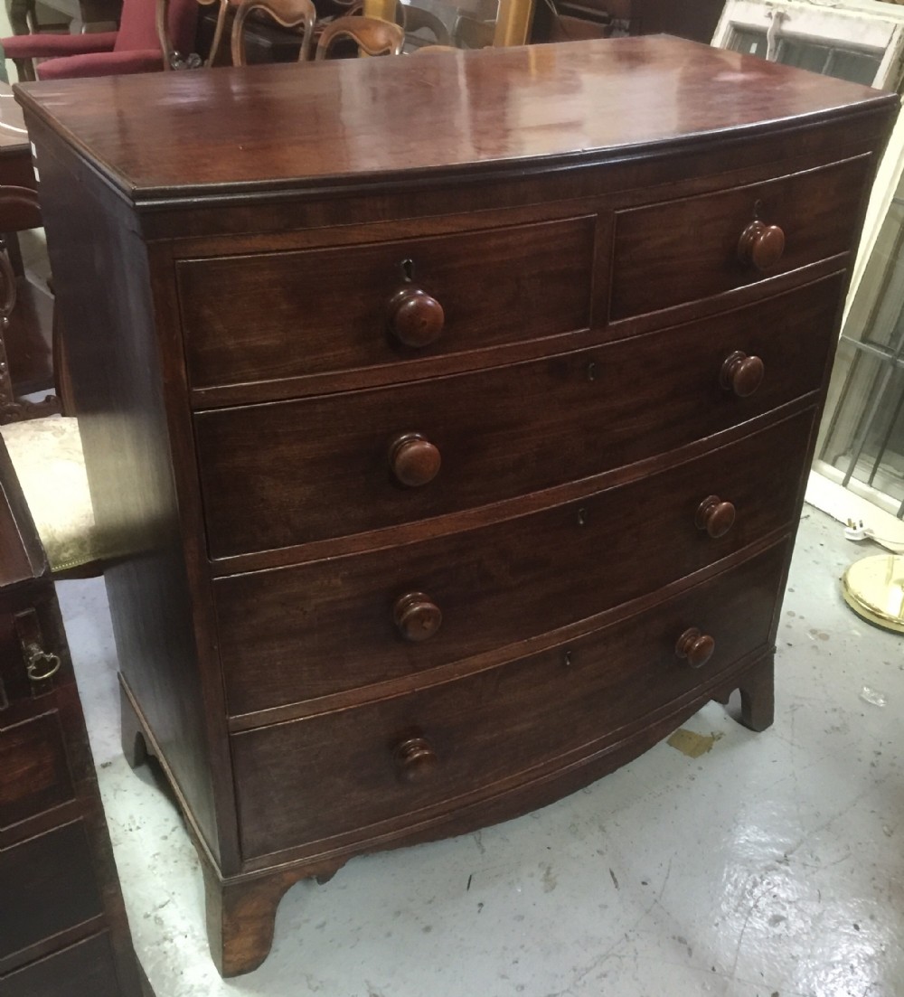 Georgian mahogany bow front chest on splayed feet 