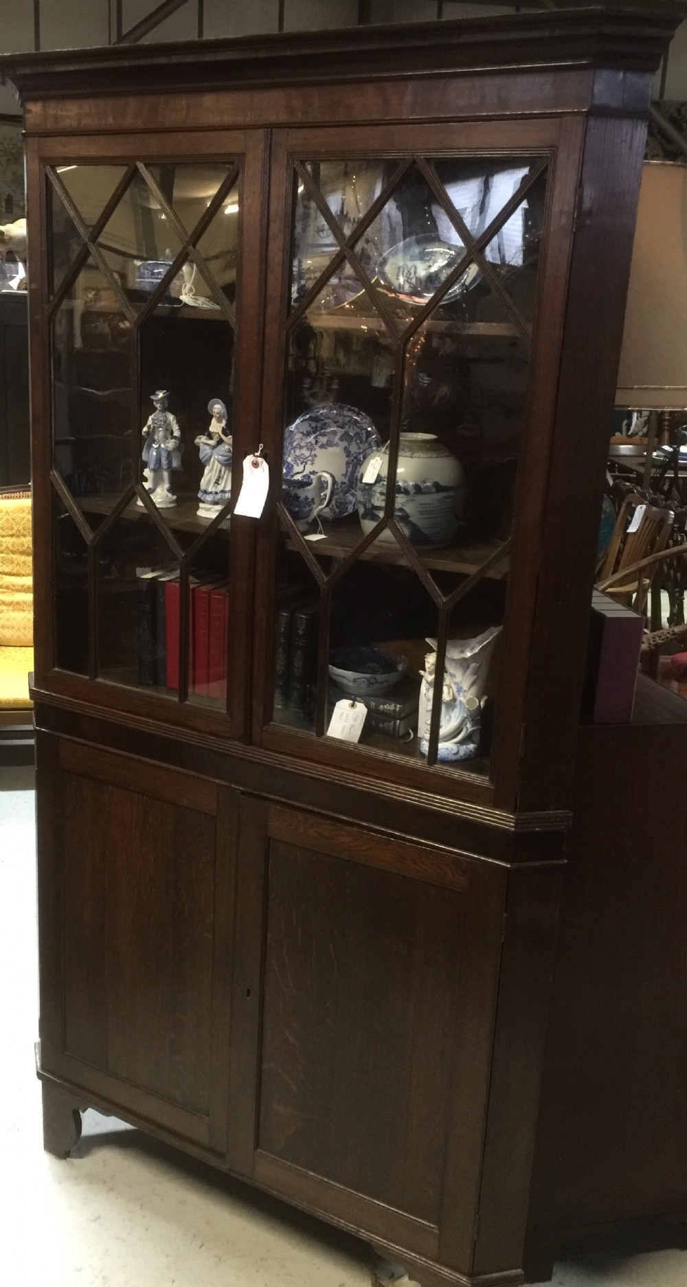 Georgian oak and mahogany glazed corner cupboard circa 1750