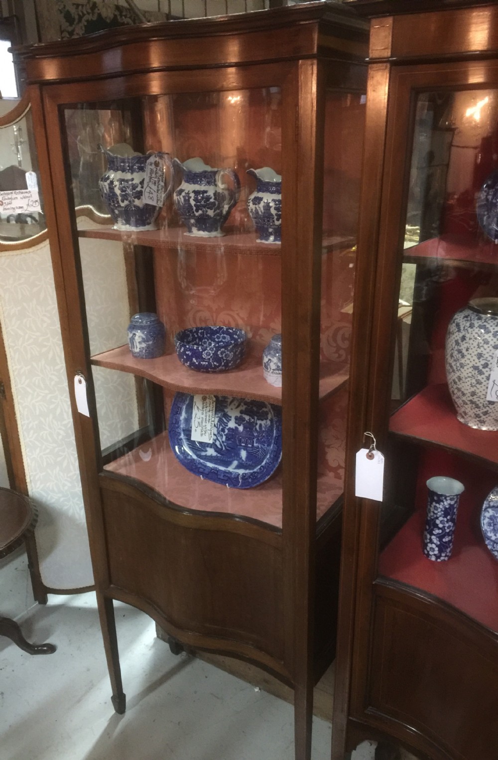 Antique Edwardian serpentine fronted mahogany display cabinet