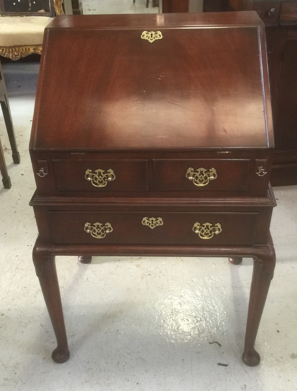 Antique George II style mahogany bureau on carved cabriole legs 