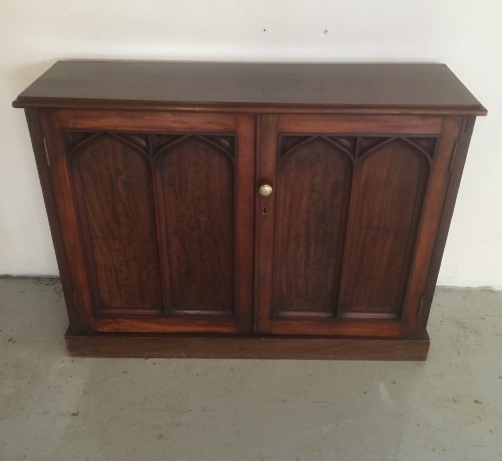 Mahogany Masonic cupboard with gothic styled doors 