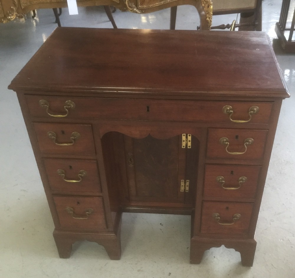 Rosewood and mahogany kneehole desk circa 1910