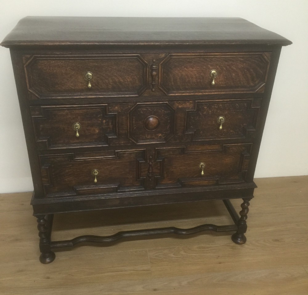 Solid oak Jacobean style chest on stand