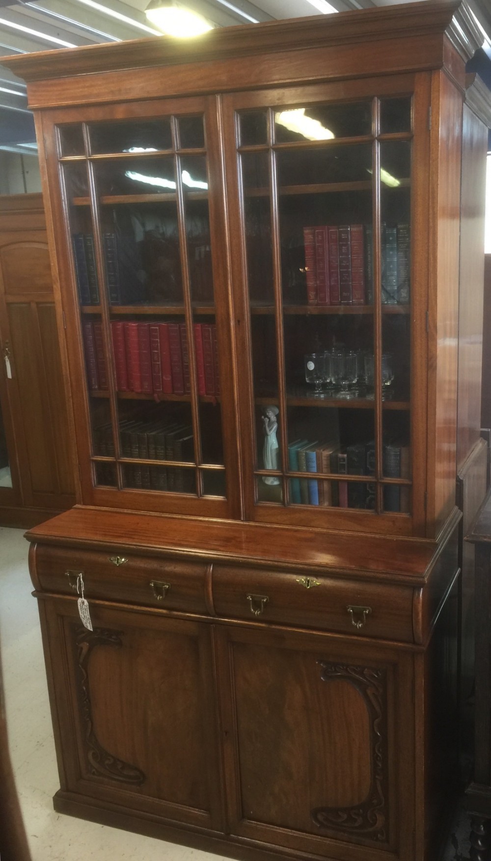 Art nouveau walnut bookcase on cupboard Circa 1890