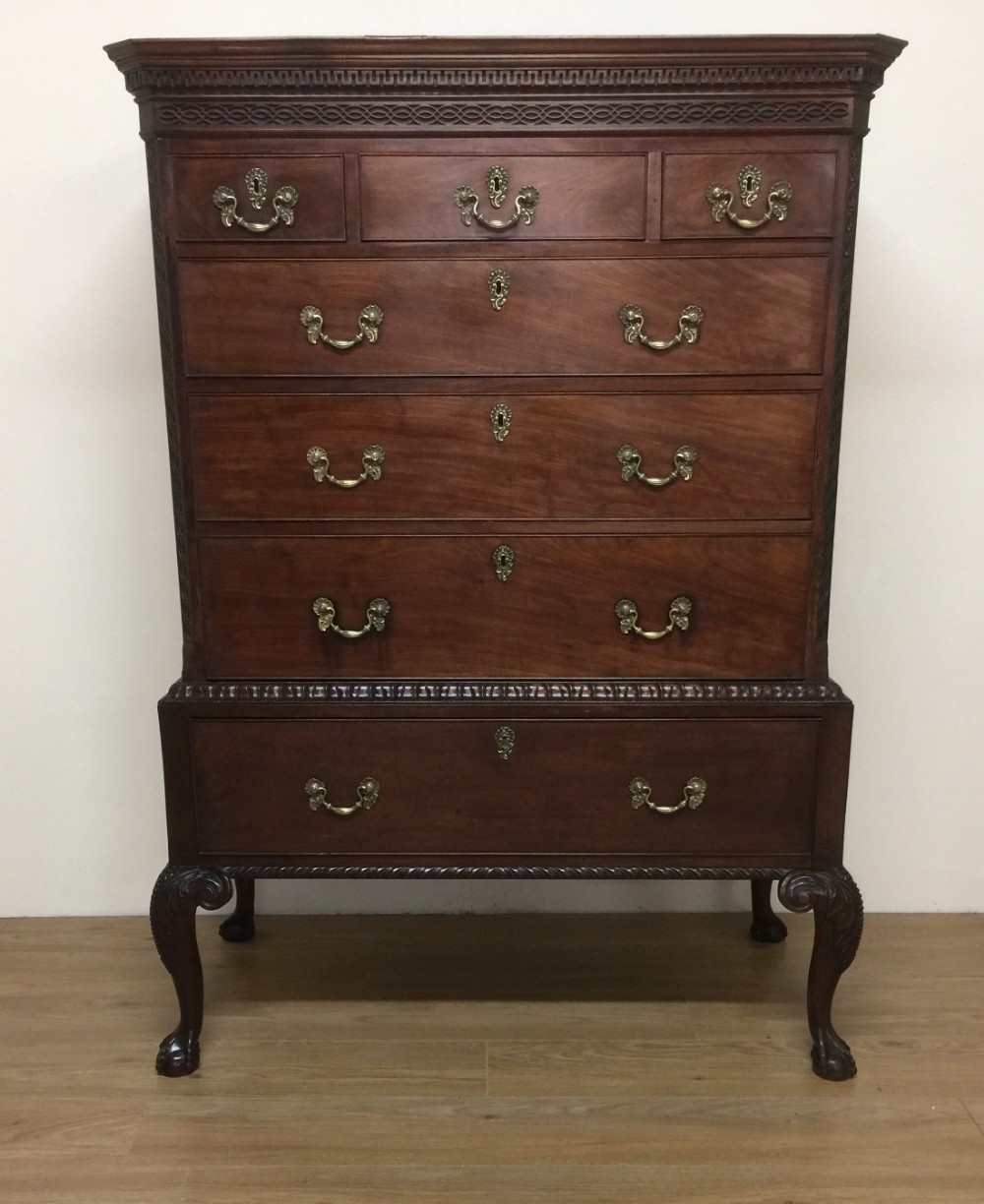Ninteenth century Chippendale style carved mahogany chest on stand. 