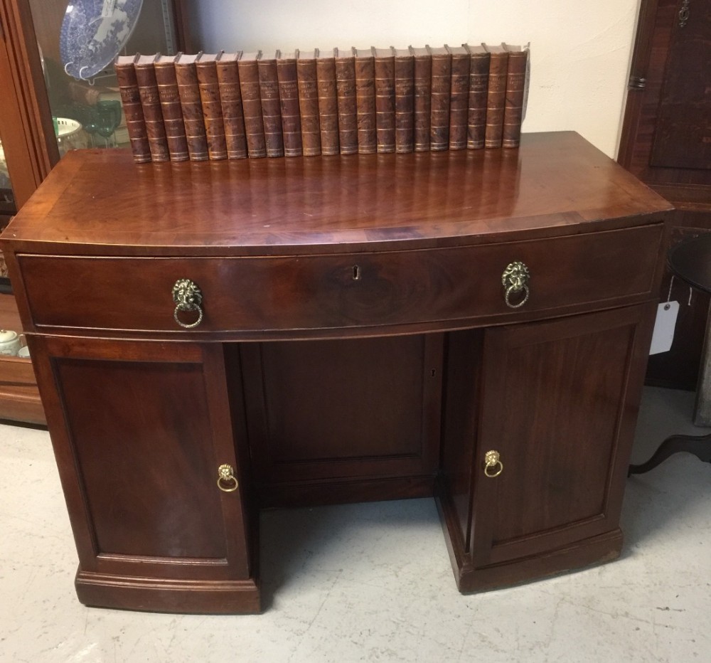 Nineteenth century bow front flame mahogany desk
