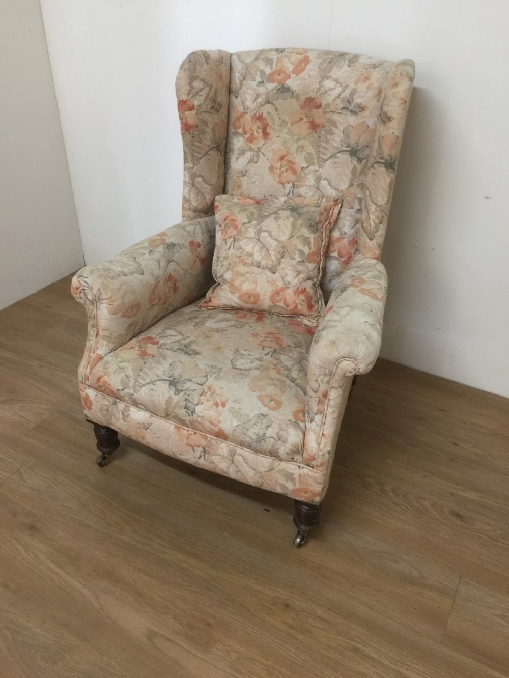 Victorian winged armchair on turned Mahogany legs circa 1880