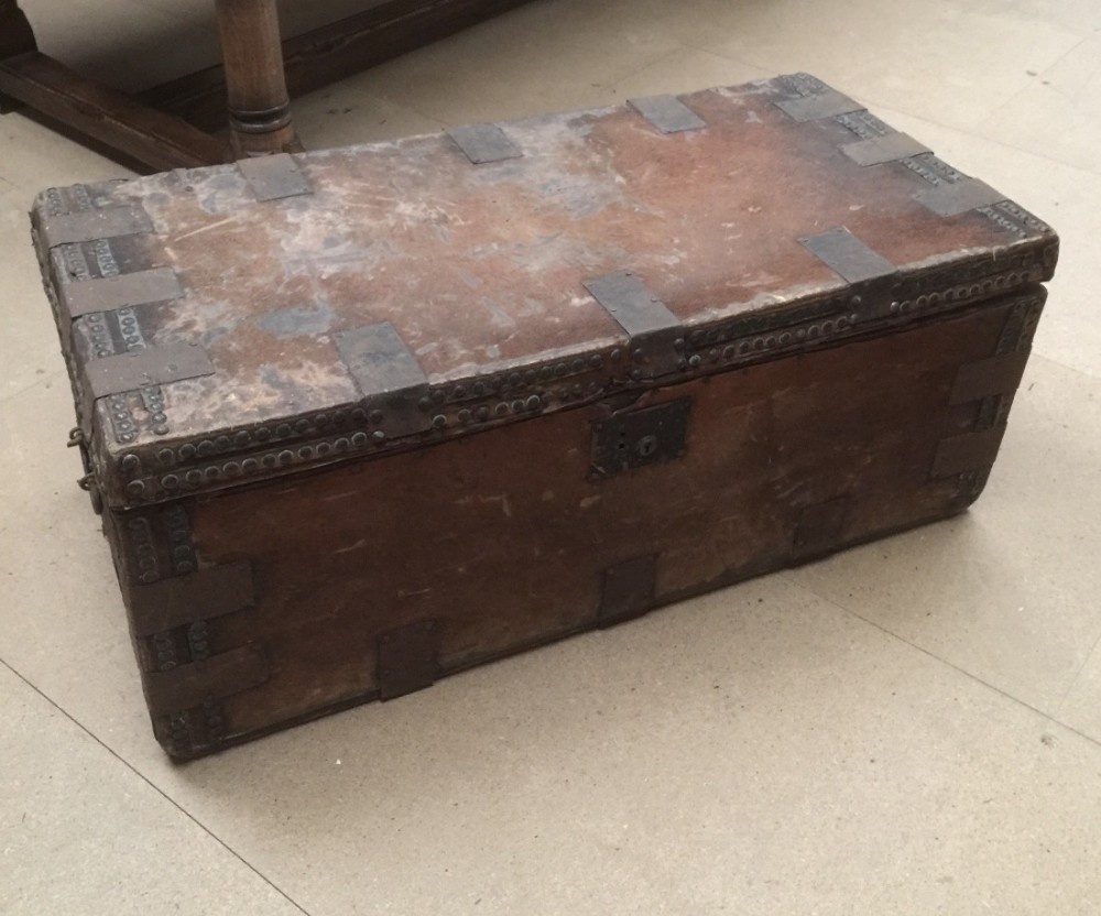 Nineteenth century hide covered metal bound trunk 