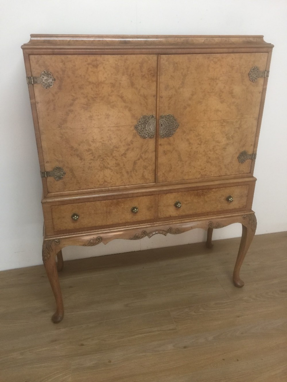 Burr walnut cocktail cabinet on cabriole legs circa 1920