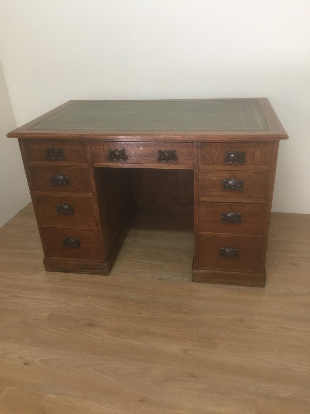 Edwardian oak twin Pedestal desk with leather top