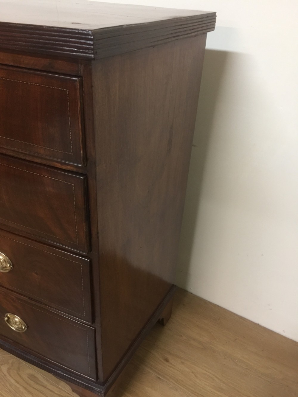 Late Georgian flame mahogany bow front chest of drawers  View III