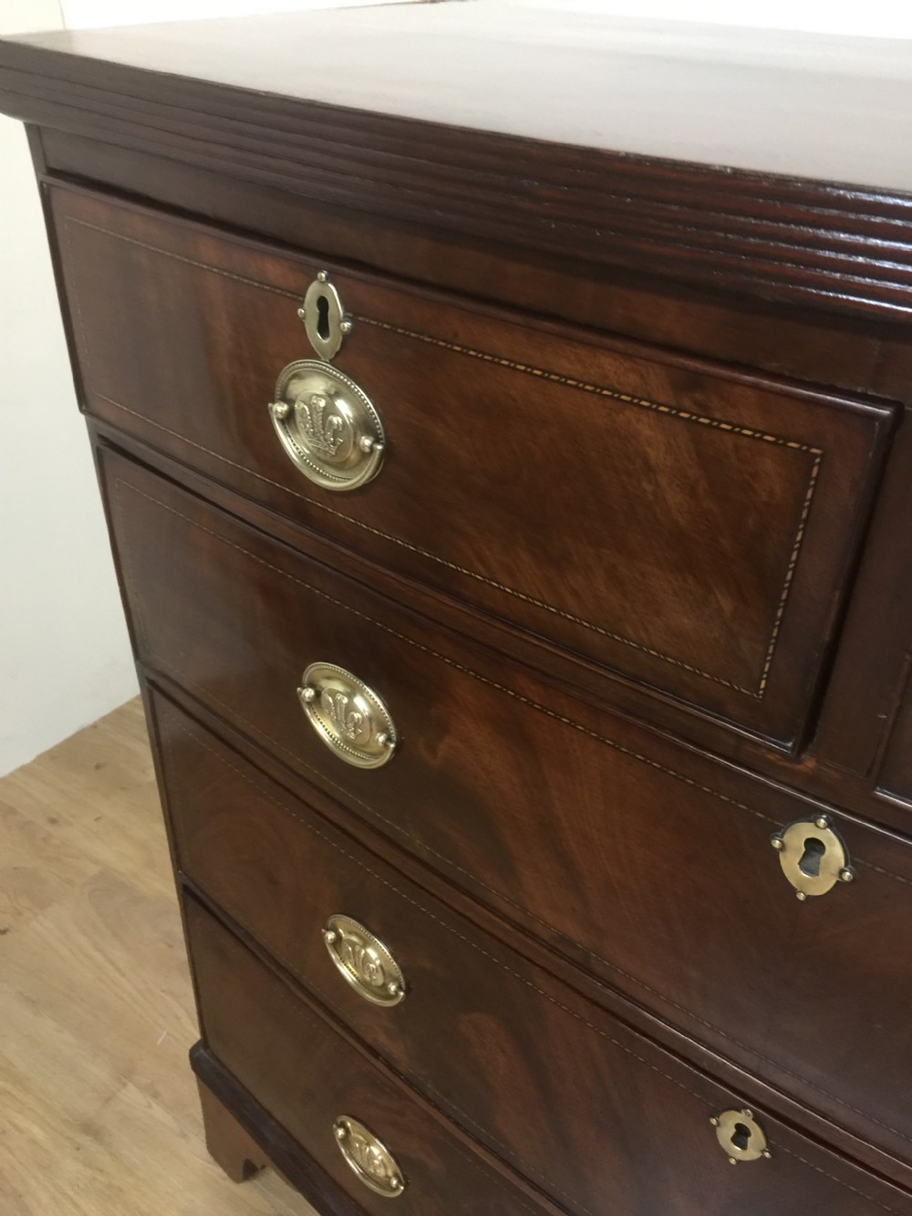 Late Georgian flame mahogany bow front chest of drawers  View VII