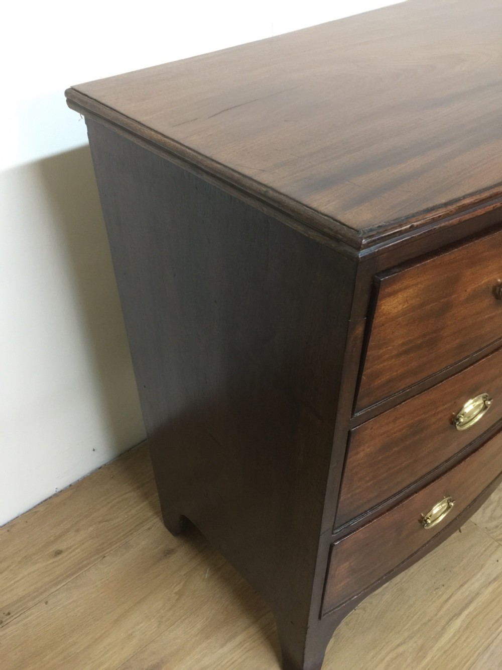 Small Georgian flame mahogany bow front chest of drawers  View VII