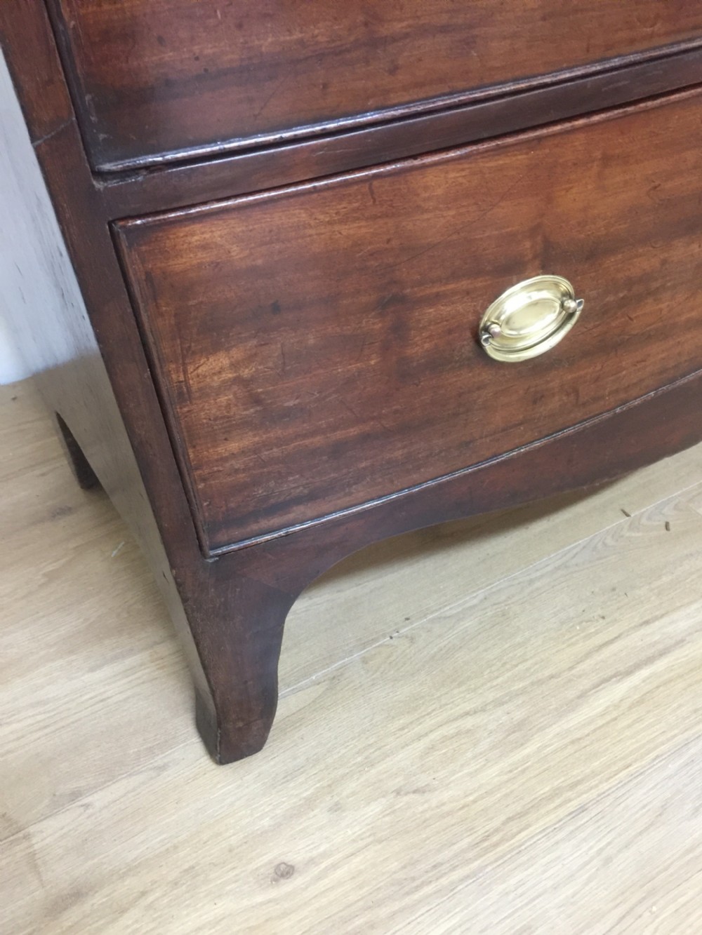 Small Georgian flame mahogany bow front chest of drawers  View VIII