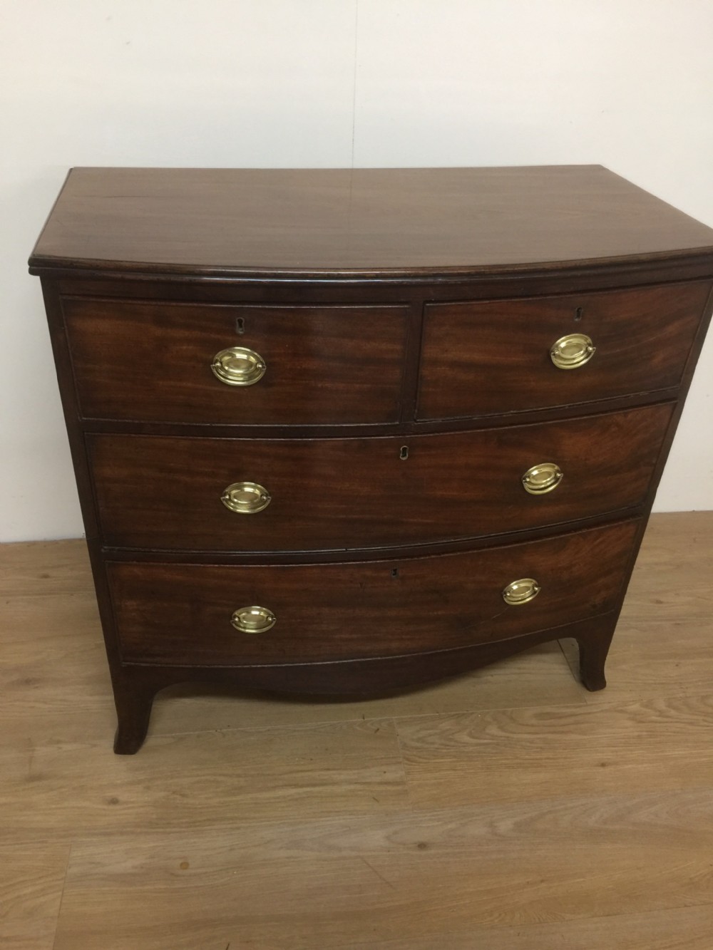 Small Georgian flame mahogany bow front chest of drawers  View X