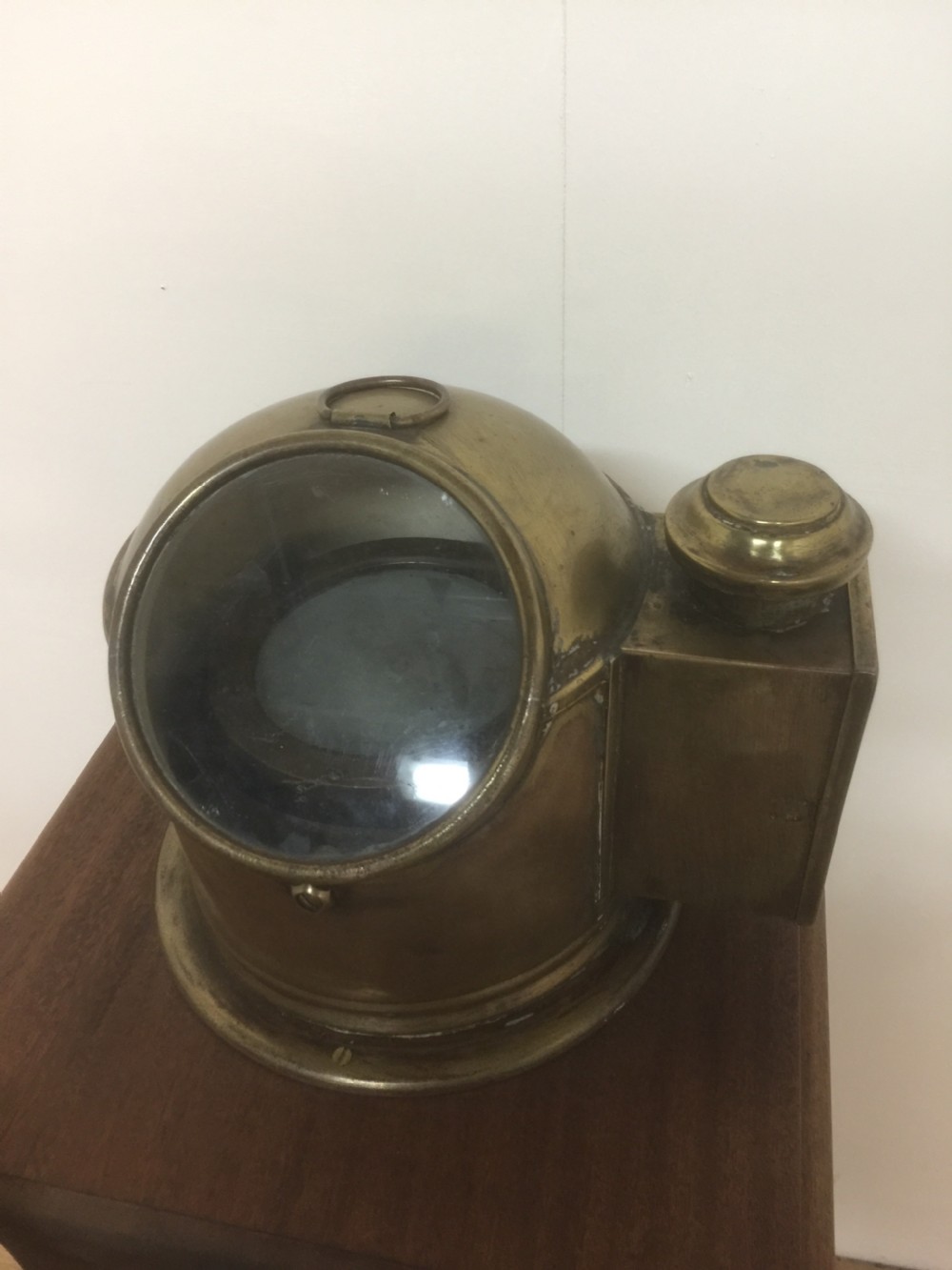 Ships wheel and binnacle on a mahogany plinth  View III