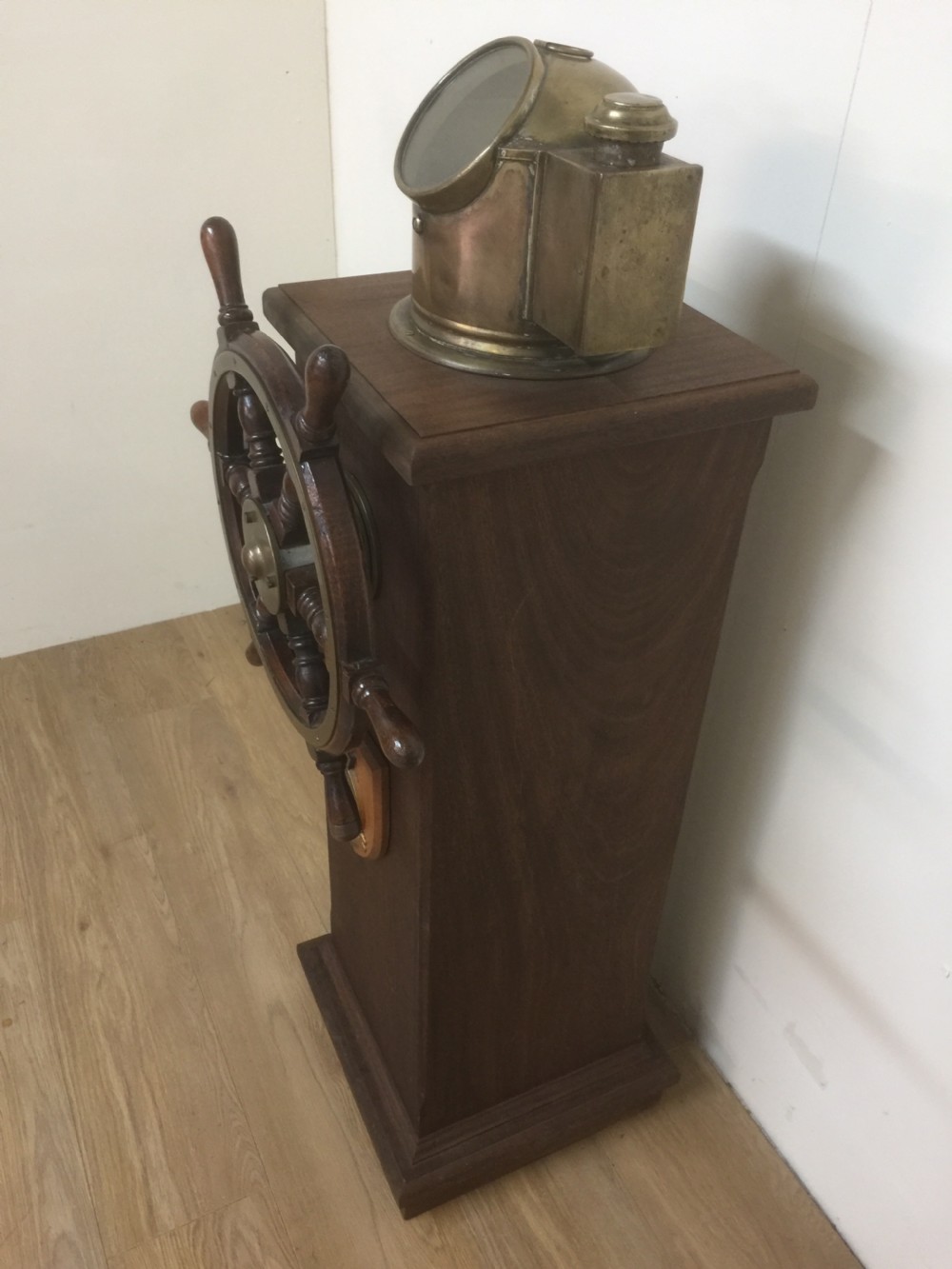 Ships wheel and binnacle on a mahogany plinth  View V