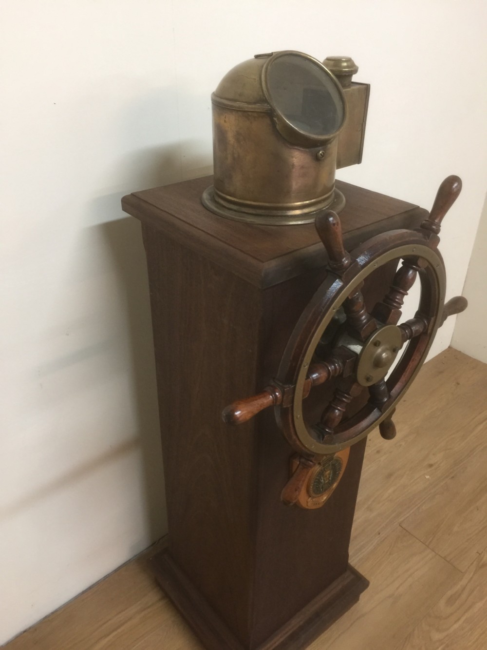 Ships wheel and binnacle on a mahogany plinth  View VI