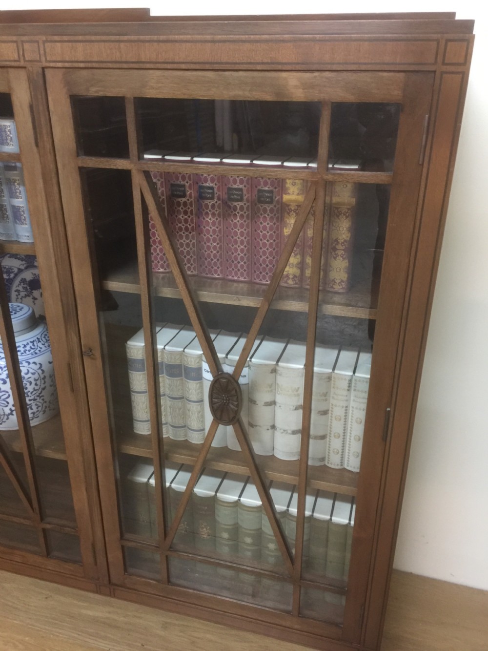 Edwardian mahogany three door glazed bookcase with ebony stringing  View II