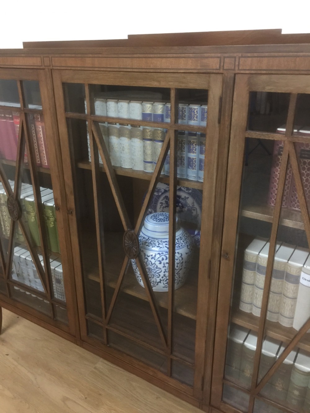 Edwardian mahogany three door glazed bookcase with ebony stringing  View III