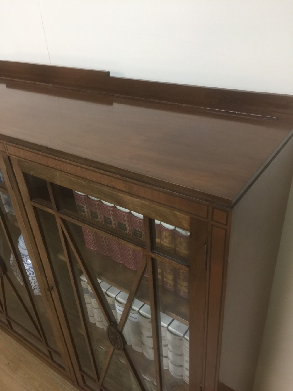 Edwardian mahogany three door glazed bookcase with ebony stringing  View IX