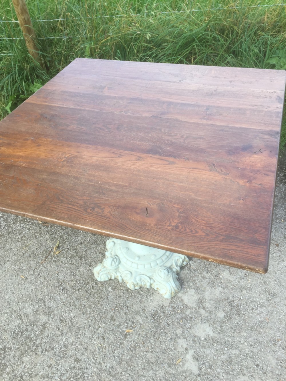 Victorian table -cast iron base and golden oak top View IV