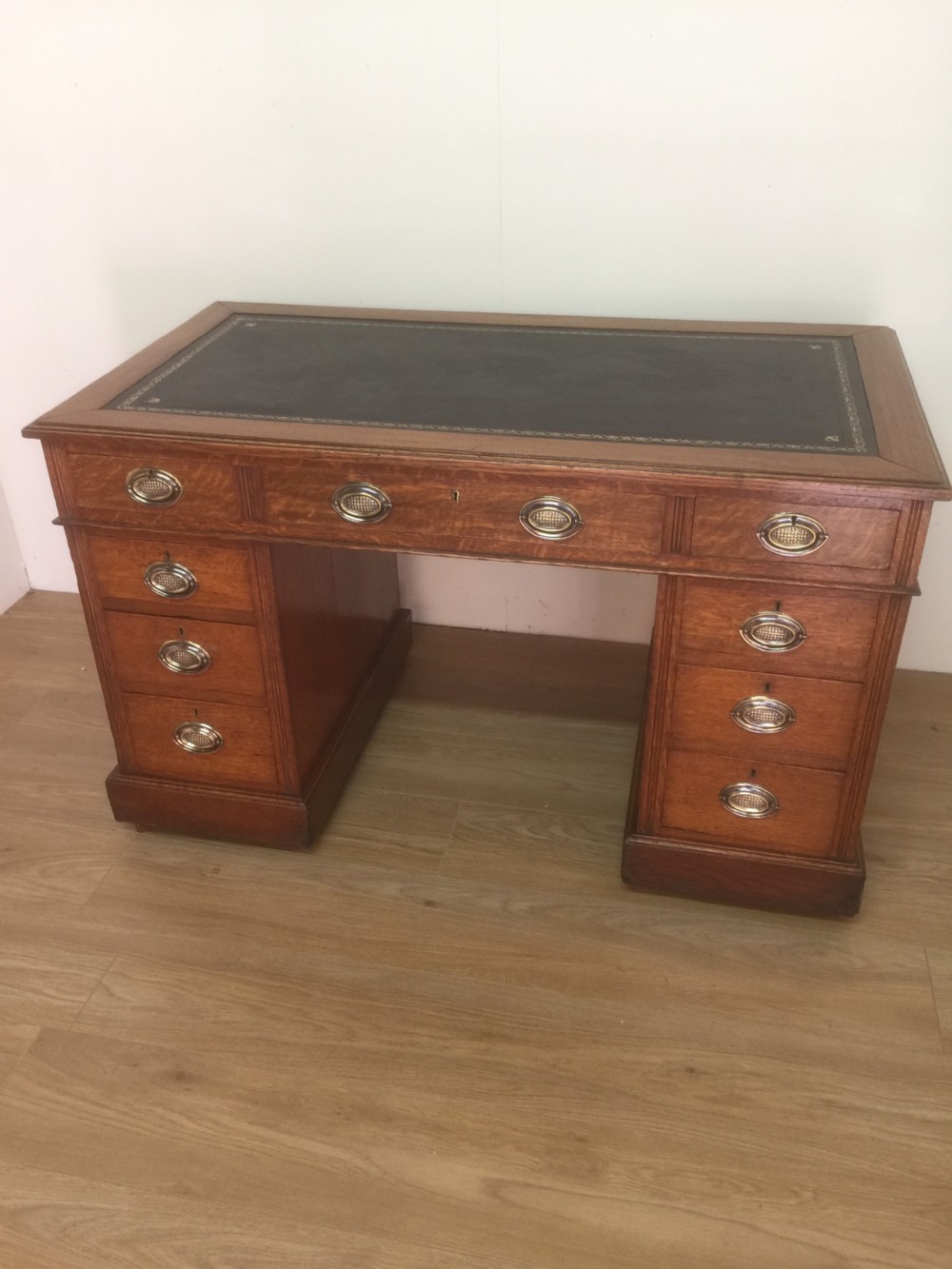 Edwardian golden oak twin Pedestal desk with tooled leather top