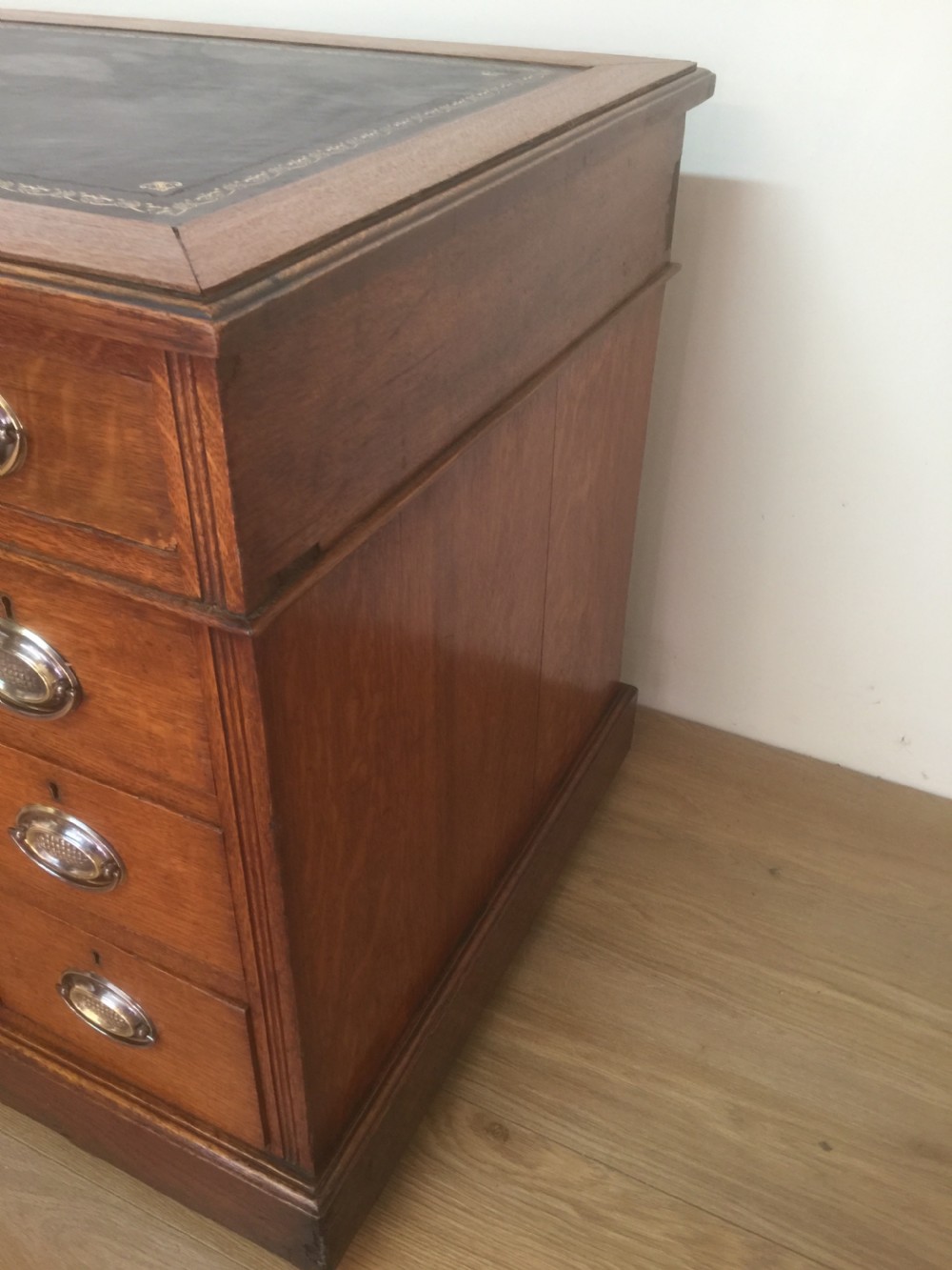 Edwardian golden oak twin Pedestal desk with tooled leather top View V