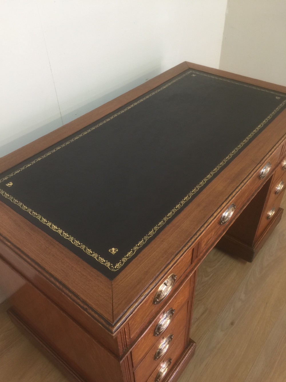 Edwardian golden oak twin Pedestal desk with tooled leather top View IX